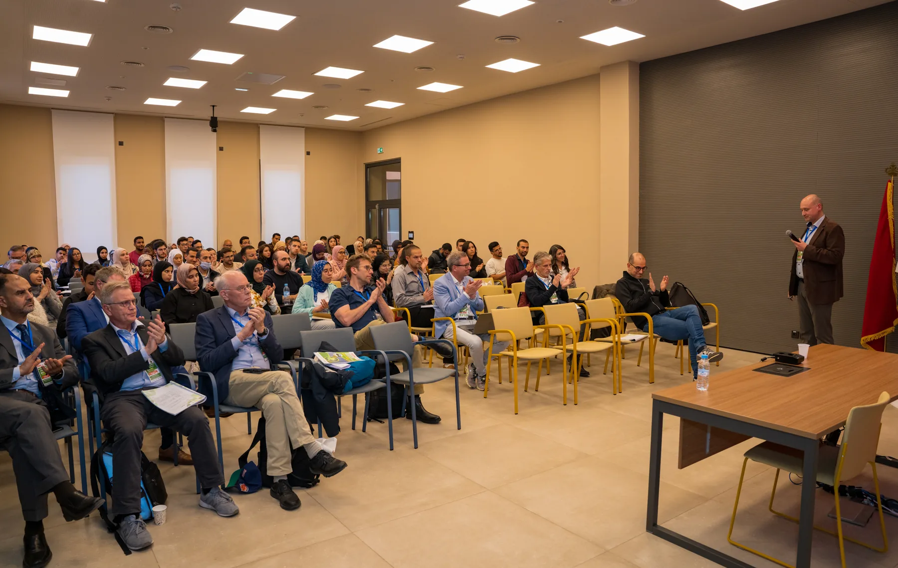 Full conference hall during a session